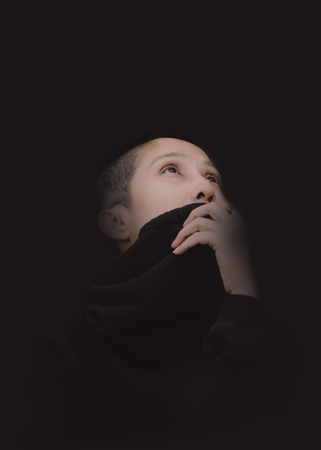 The skinhead woman put her hand closed her mounth on the black scene.