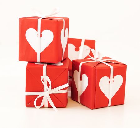 Red and white gift box with ribbons for loveの写真素材