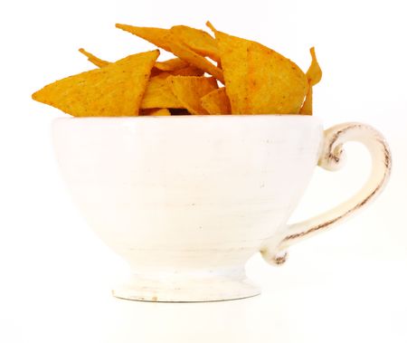 Bowl of Mexican chips isolated on white backgroundの写真素材