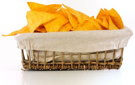 Chips in basket - Mexican chips in a basket on tableの写真素材