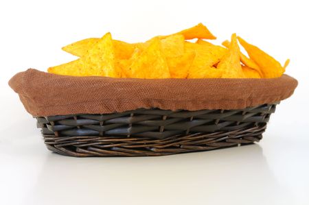 Chips in basket - Mexican chips in a basket on tableの写真素材