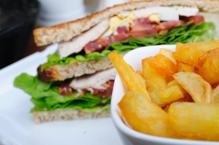Sandwich with bacon - chicken, cheese and lettuceの写真素材