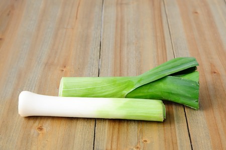 Spring Onion's bunch on the wooden table  