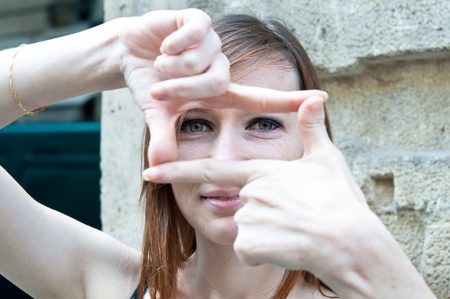 Young woman is focused view in the streets of Parisの写真素材