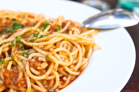 Italian meat sauce noodles on the tableの写真素材