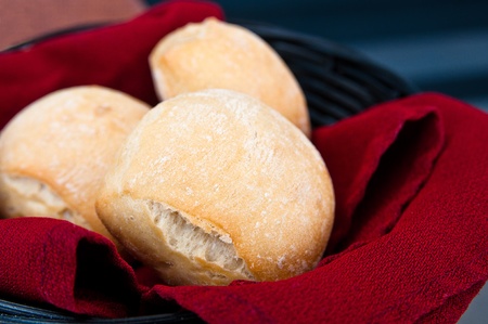 bread in basket - little roll breads in basket on table