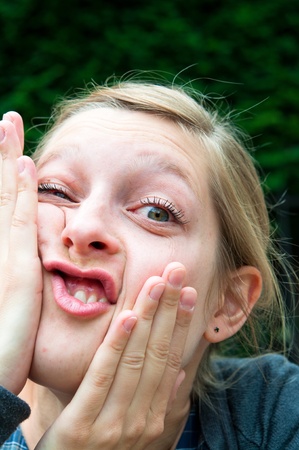 expression-Young woman making a funny grimace の写真素材