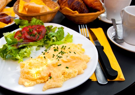 omelet with ham tomato and green saladの写真素材