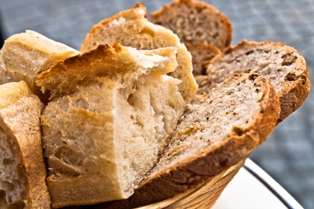 bread in basket - little roll breads in basket on table