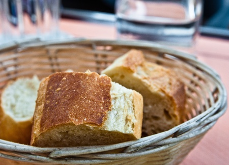 bread in basket - little roll breads in basket on table