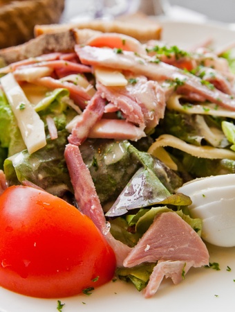 Fresh fruits salad and ham with eggの写真素材