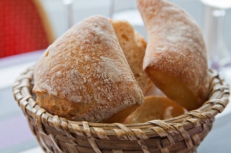 bread in basket - little roll breads in basket on table