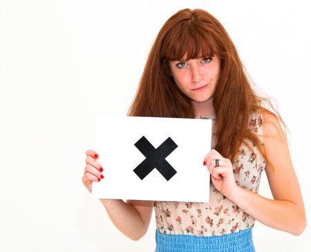 unhappy portrait young woman with board NOの写真素材