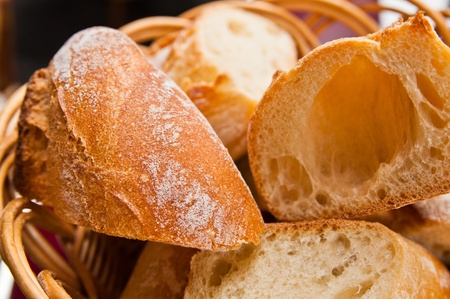 bread in basket - little roll breads in basket on table