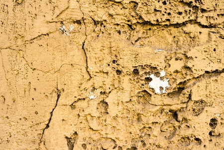 Brown grungy wall - Sandstone surface backgroundの写真素材