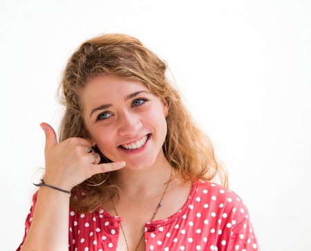 smiling portrait young woman talk on a cellular telephoneの写真素材
