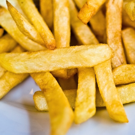 Golden French fries potatoes ready to be eaten