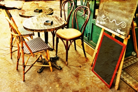 old-fashioned Cafe terrace with tables and chairs,paris Franceの写真素材