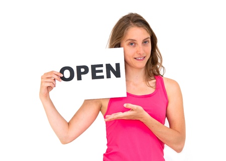 happy portrait young woman with board OPENの写真素材