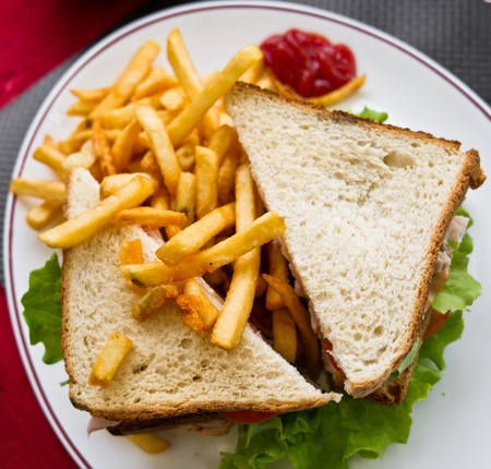 Sandwich with bacon - chicken, cheese and lettuceの写真素材