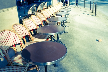 Street view of a coffee terrace with tables and chairs,paris Franceの写真素材