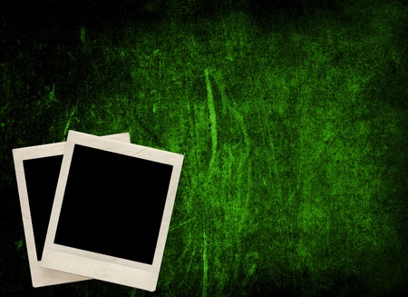 Blank photo frame with textured grunge backgroundの写真素材