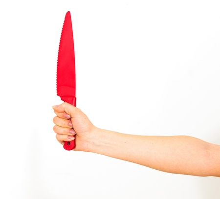 Woman with a knife, Isolated on whiteの写真素材