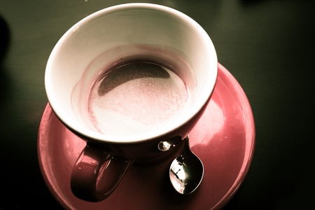 wonderful white cup of hot coffee on table