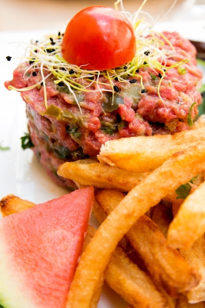 tasty tartare(Raw beef) - classic steak tartare on white plateの写真素材