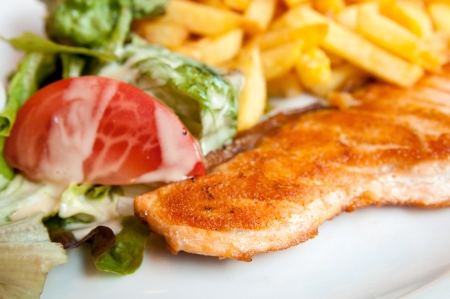 tasty pasta with salmon on a the tableの写真素材