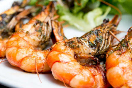 Fried shrimp-delicious fried shrimp with lettuce in white plateの写真素材