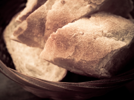 bread in basket - little roll breads in basket on table