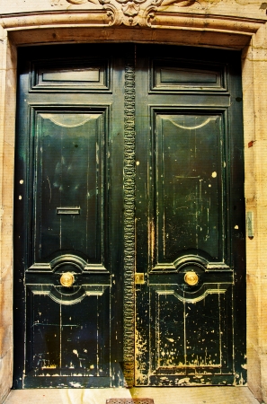 old-fashioned wooden door grunge textures and backgroundsの写真素材