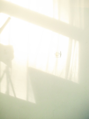 Artistic style-shadow and lighting on white wall abstract background