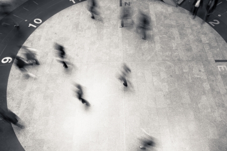 Busy walking - Business people walking along subwayの写真素材