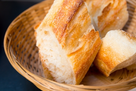 bread in basket - little roll breads in basket on tableの写真素材