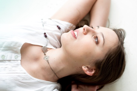 indoor portrait of a thinking womanの写真素材