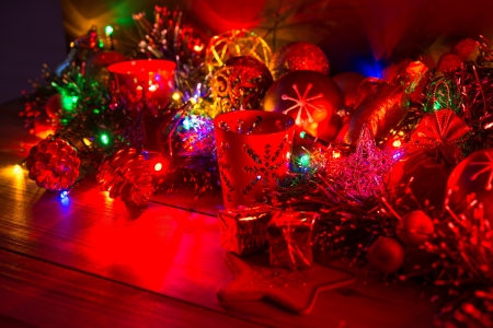 Christmas decoration with candles over dark background
