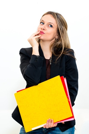 Thinking expression woman in officeの写真素材