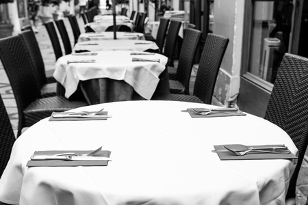 Street view of a coffee terrace with tables and chairs,paris Franceの写真素材