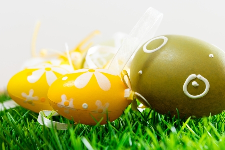 Easter eggs on green grassの写真素材