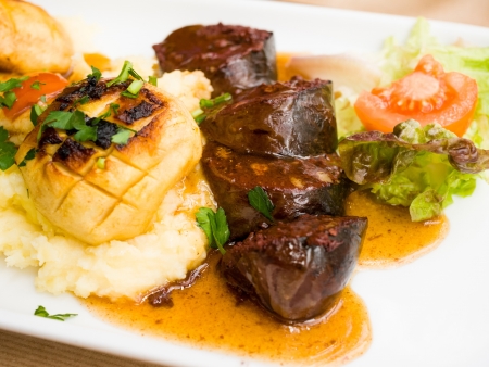 Traditional French cuisine Boudin Noir on table