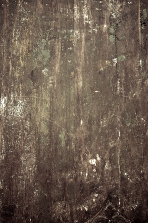 Vintage stained wooden wall background textureの写真素材