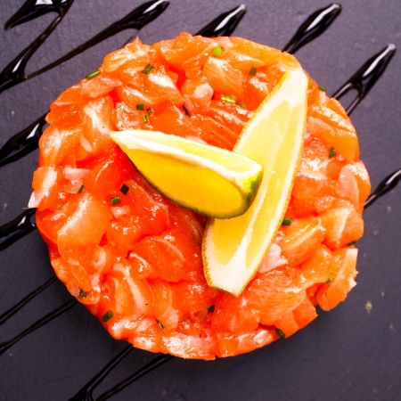 french cuisine dish with lemon and salmonの写真素材