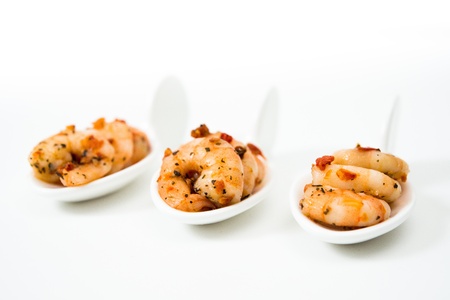 Shrimp with white wine sauce on table の写真素材