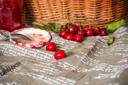 fresh cherries on brown napkinの写真素材
