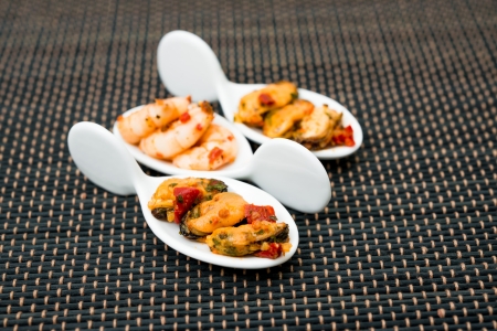 Mussel and Shrimp with white wine sauce on table の写真素材