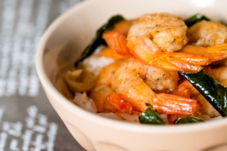 Bowls of delicious asian fried shrimp and riceの写真素材