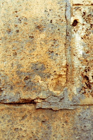 Brown grungy wall - Sandstone surface backgroundの写真素材