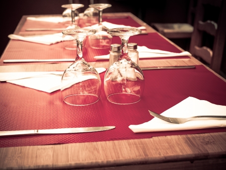 table setting - plate, knife and fork on table